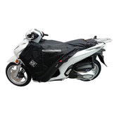 Coprigambe Termoscud R222X, un coprigambe impermeabile e termico. Su scooter. Di Tucano Urbano.